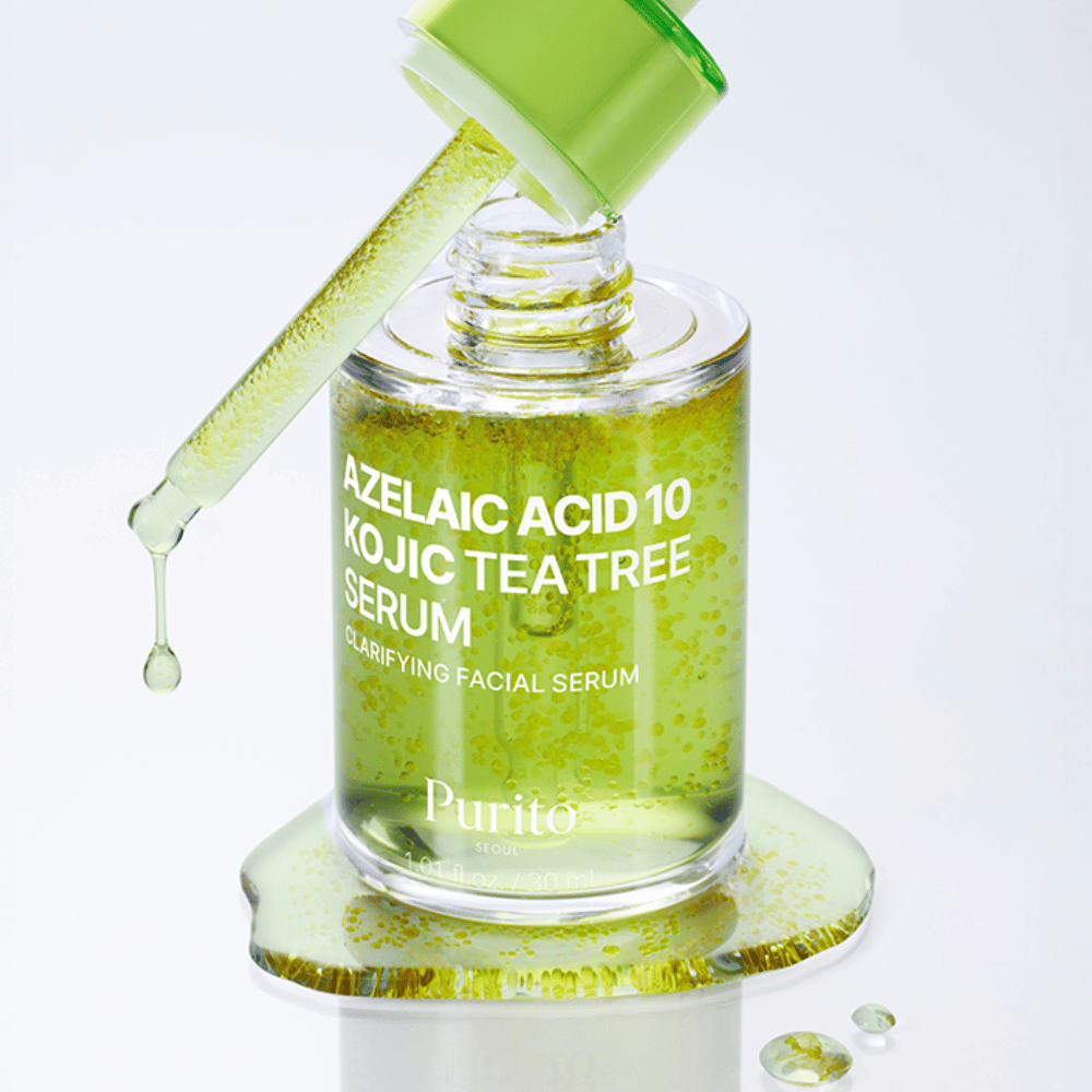 Zbliżenie na Purito Azelaic Acid 10 Kojic Tea Tree Serum z pipetą i kroplami. Daje jaśniejszą skórę i redukuje zanieczyszczenia.