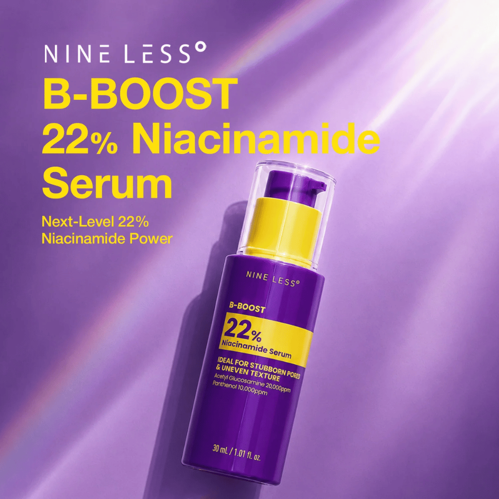 6. NINE LESS B-Boost 22% Niacinamide Serum – fioletowa butelka serum z żółtą etykietą na widoczne pory