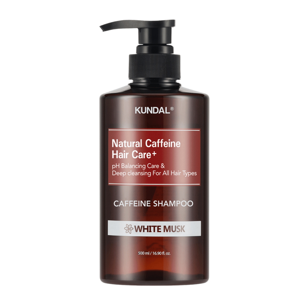 KUNDAL Natural Caffeine Hair Care+ Szampon White Musk w brązowej plastikowej butelce z pompką, 500 ml.