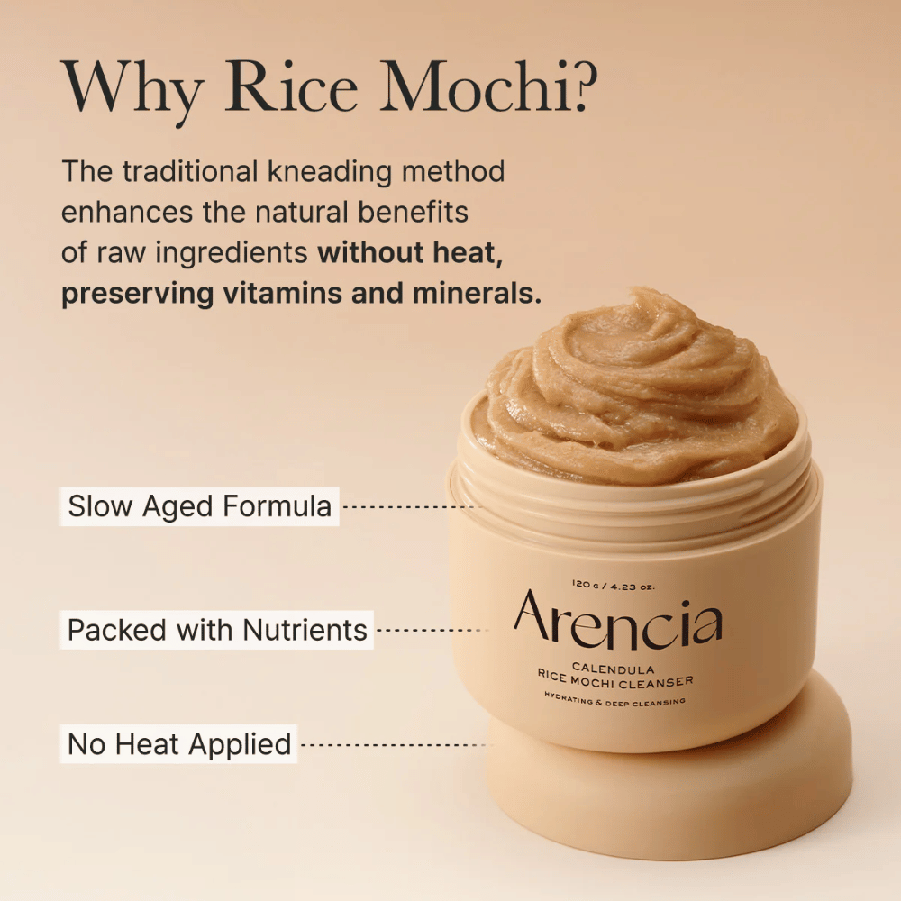 Arencia Calendula Rice Mochi Cleanser z opisem jej formuły tłoczonej na zimno, która zachowuje witaminy i minerały dla odżywczej pielęgnacji skóry.