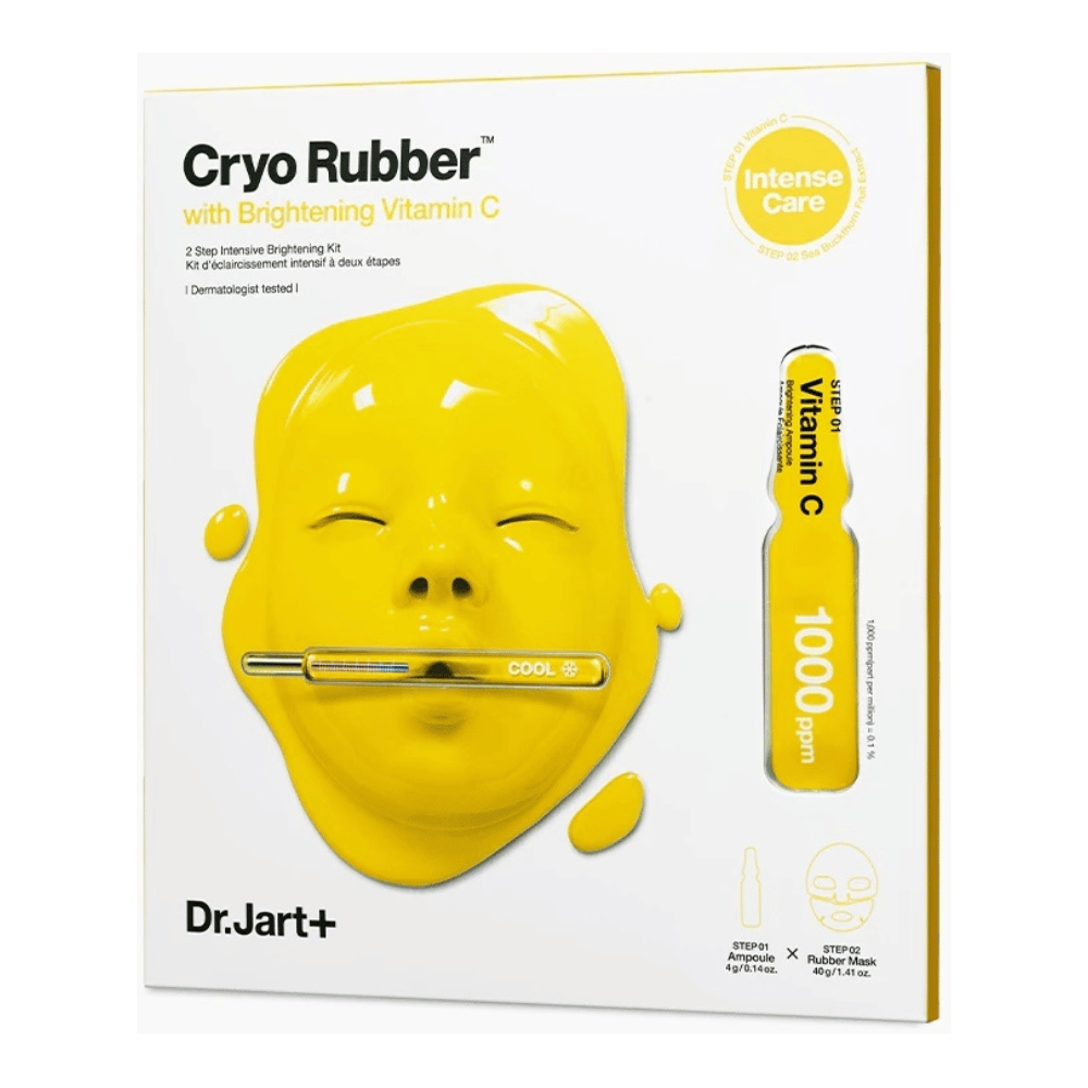 Dr.Jart+ produkt kosmetyczny o nazwie 'Cryo Rubber™ z Rozjaśniającą Witaminą C'. Opakowanie przedstawia żółtą maskę na twarz, z której kapie płyn. Wspomniano, że jest to '2-etapowy intensywny rozjaśniający ZESTAW' i że jest 'testowany dermatologicznie'. Ilustracja 'Witamina C 1000ppm' znajduje się po prawej stronie.