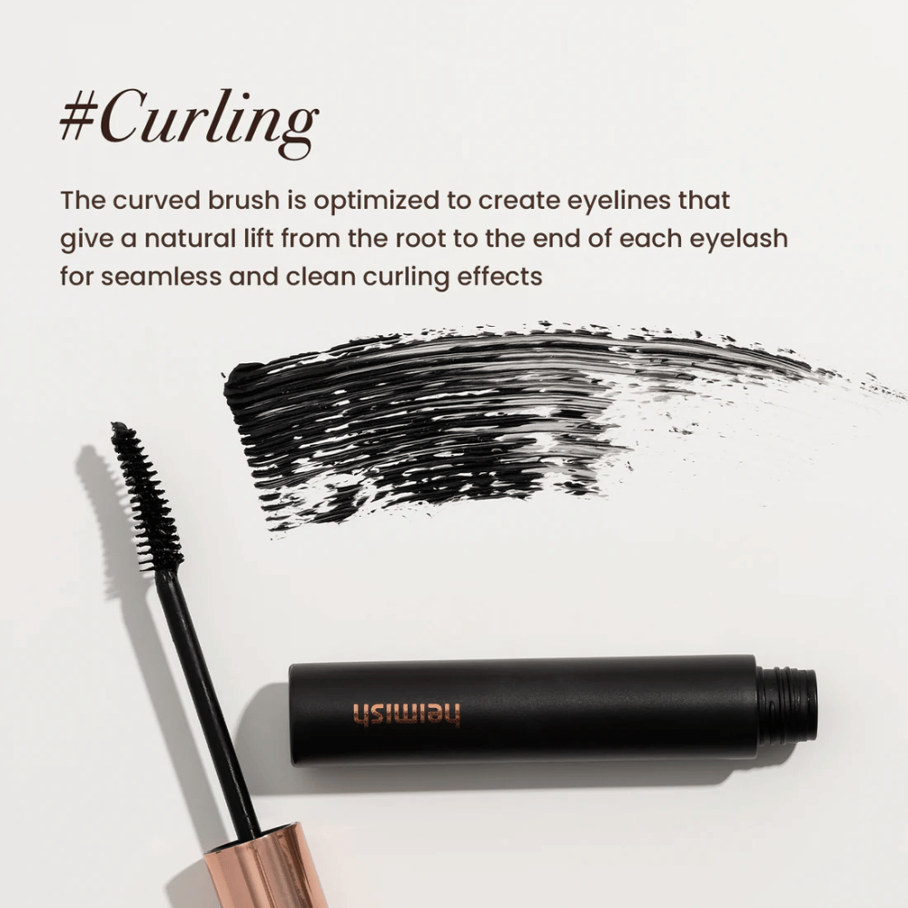Heimish Dailism Smudge Stop Mascara Podkręcanie ze zgiętą szczoteczką, która unosi i kształtuje rzęsy dla naturalnego, ale trwałego efektu podkręcenia.