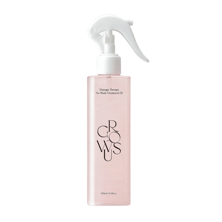 Zdjęcie produktu na białym tle przedstawiające GROWUS Damage Therapy No-Wash Treatment EX w różowej butelce z atomizerem z formułą bez spłukiwania do nawilżenia i pielęgnacji zniszczonych włosów.
