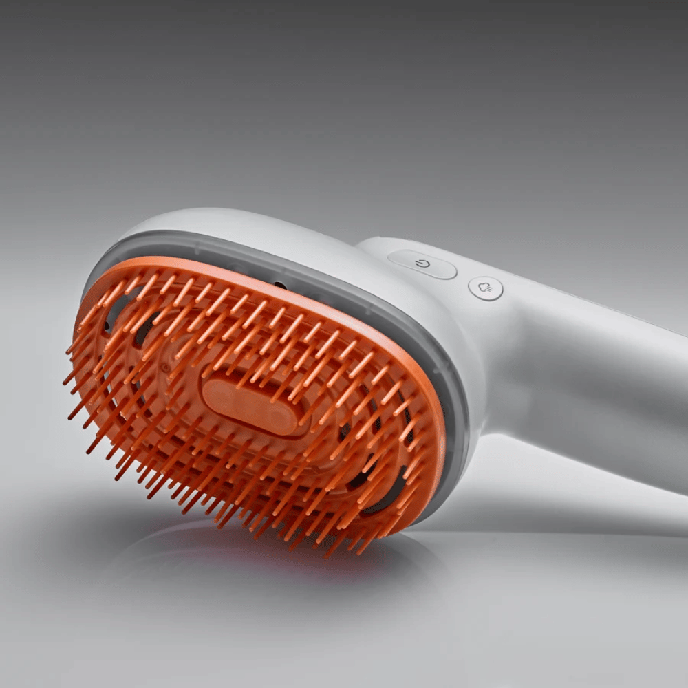 LILYEVE GrowTurn Brush Steam Booster – zbliżenie głowicy szczotki i przycisków sterujących