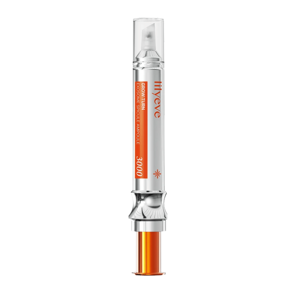 LILYEVE Grow Turn Exosome Spicule Ampoule 3000 – ampułka do skóry głowy z precyzyjnym aplikatorem w srebrno-pomarańczowym opakowaniu.