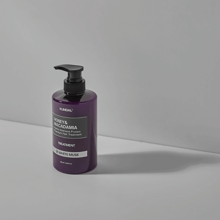 KUNDAL Honey & Macadamia Hydro-Intensive Protein Premium Hair Treatment White Musk i lila pumpflaska, 500 ml.
