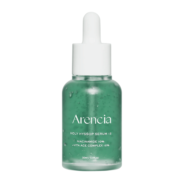 Arencia Holy Hyssop Serum 12 w zielonej szklanej butelce z pipetą, serum do twarzy z niacynamidem 10% i kompleksem witamin ACE 12%.