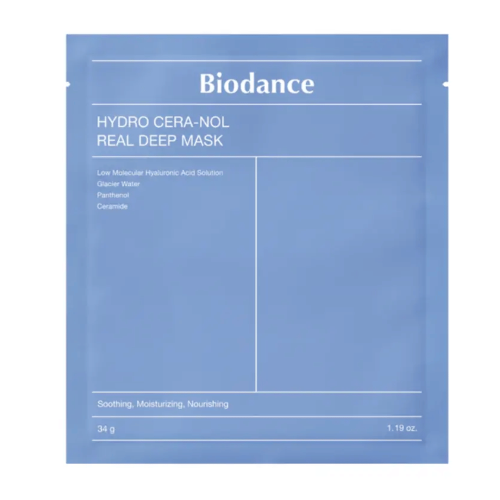 Opakowanie pokazuje "Biodance Hydro Cera-Nol Real Deep Mask". To kojąca, nawilżająca i odżywcza maseczka do twarzy zawierająca niskocząsteczkowy kwas hialuronowy, wodę lodowcową, pantenol i ceramidy. Design jest prosty, w kojącym niebieskim odcieniu.