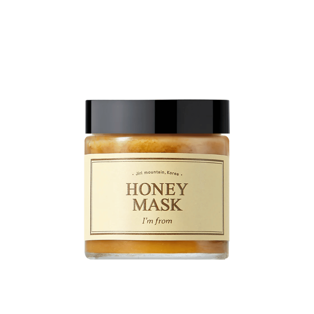  Słoik "I'm from Honey Mask", z naturalną zawartością miodu, na białym tle.