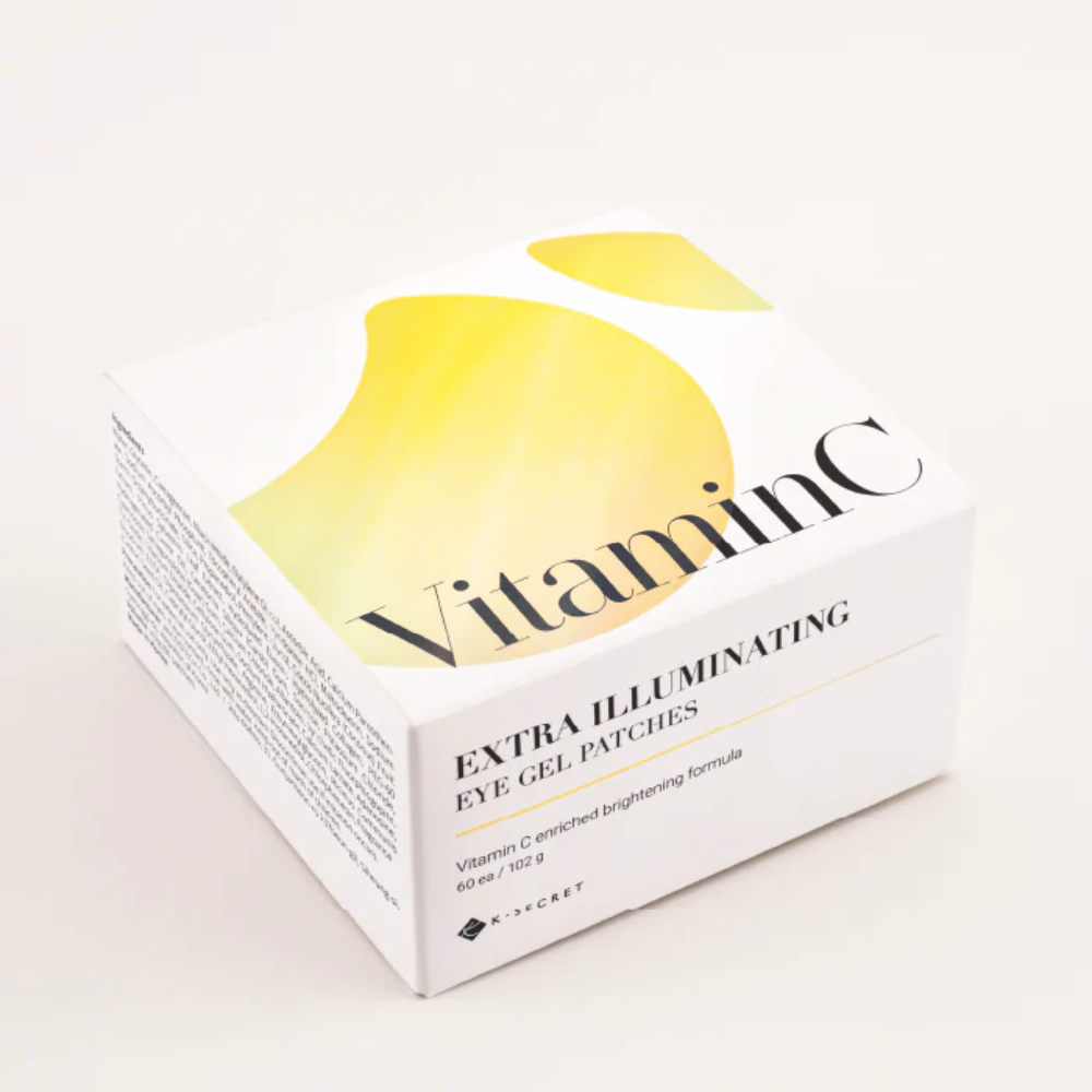 Opakowanie K-Secret Extra Illuminating Eye Gel Patches z witaminą C w białym i żółtym wzorze.