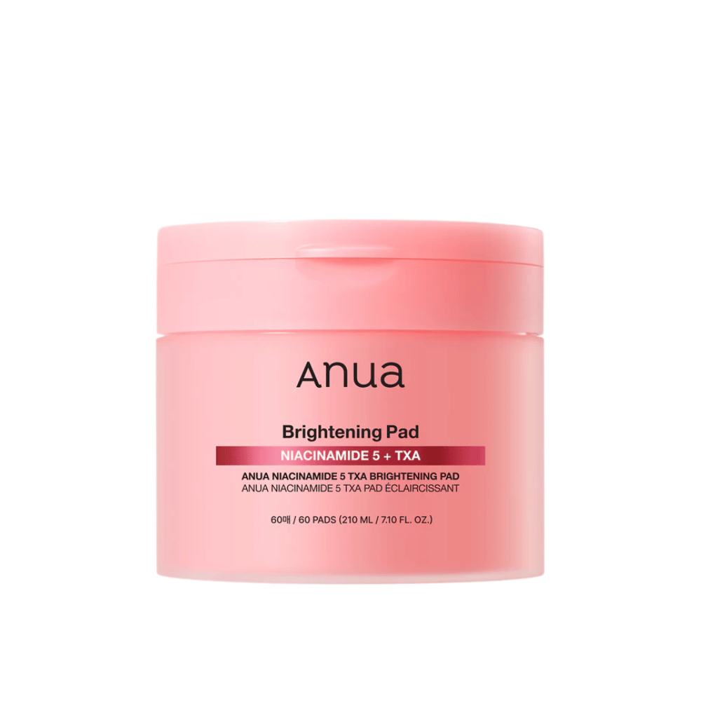 Różowe opakowanie Anua Brightening Pad z napisem "Niacinamide 5 + TXA", zawiera 60 płatków do pielęgnacji skóry z naciskiem na blask i wyrównanie kolorytu skóry.