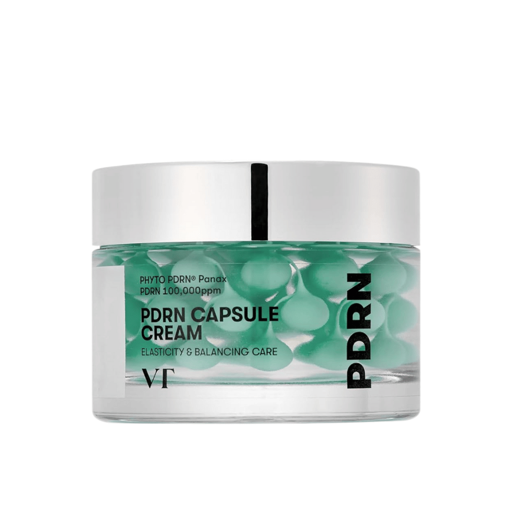 VT PDRN Capsule Cream w przezroczystym słoiku z srebrnym wieczkiem. Zawartość składa się z zielonych kapsułek w klarownym żelu, a etykieta wskazuje, że krem jest przeznaczony do elastyczności i zrównoważonej pielęgnacji skóry.