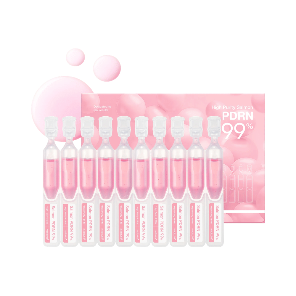 Medicube PDRN Pink One Day Serum Set z dziesięcioma indywidualnymi ampułkami i opakowaniem produktu. Zestaw zawiera serum z 99% wysoko oczyszczonym łososiowym PDRN do nawilżenia, blasku i codziennej pielęgnacji skóry.