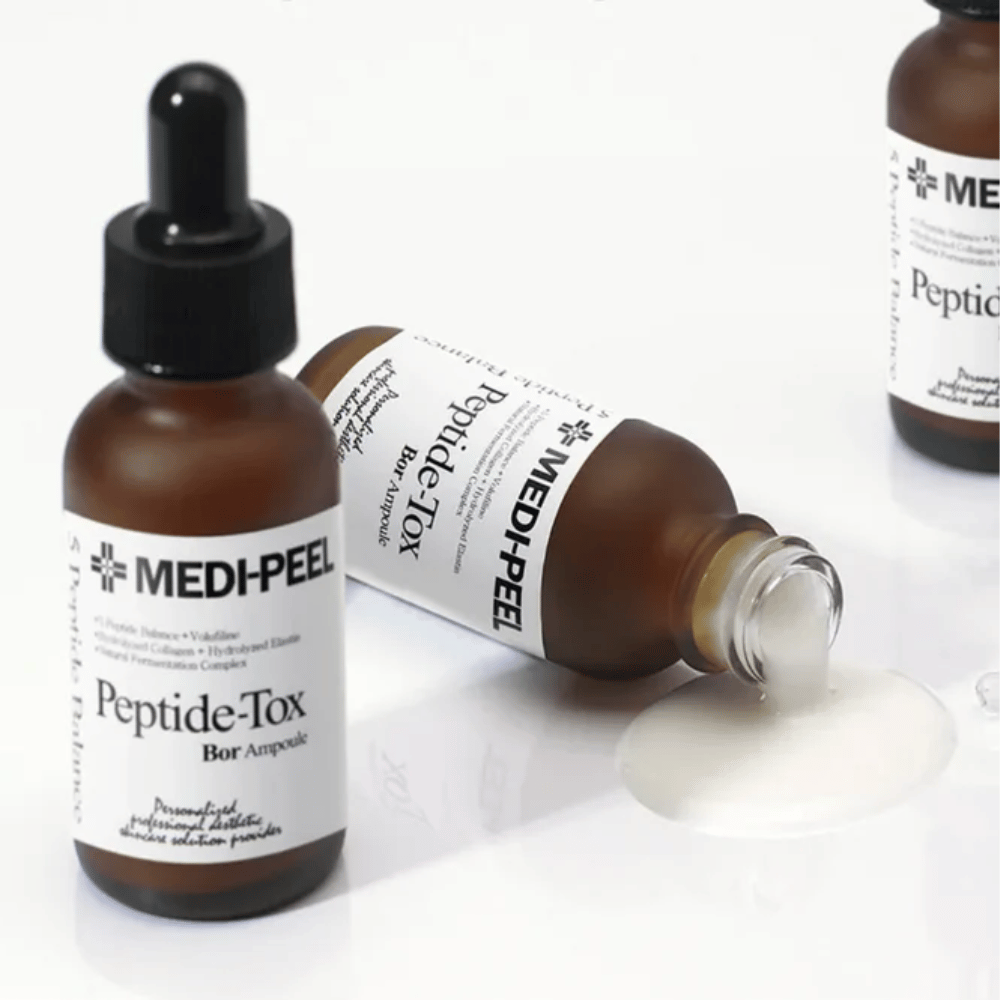 MEDI-PEEL Peptide-Tox Bor Ampoule z widoczną teksturą serum – serum przeciwstarzeniowe z kompleksem peptydowym, które zwiększa elastyczność, wypełnia skórę i wyrównuje strukturę skóry.