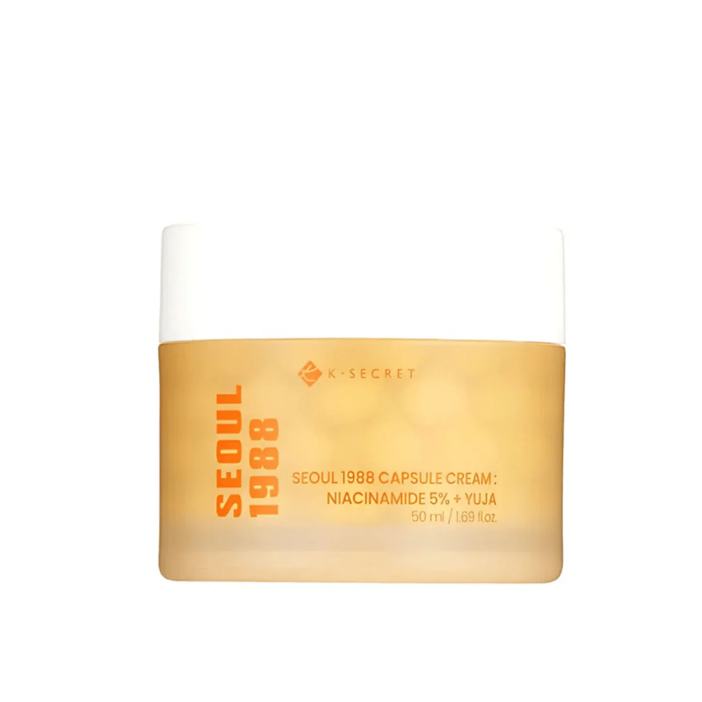 Słoik z K-Secret Seoul 1988 Capsule Cream Niacinamide 5% + Yuja, 50 ml, w złotym designerskim opakowaniu.