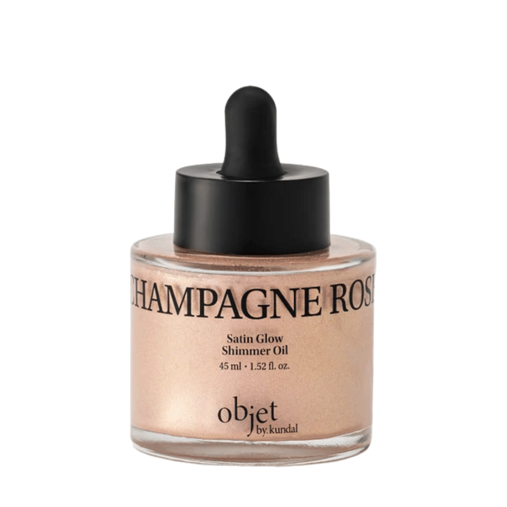 Objet by KUNDAL Satin Glow Shimmer Oil Champagne Rose 45 ml – rozświetlający olejek do ciała z delikatnym różowozłotym połyskującym wykończeniem.