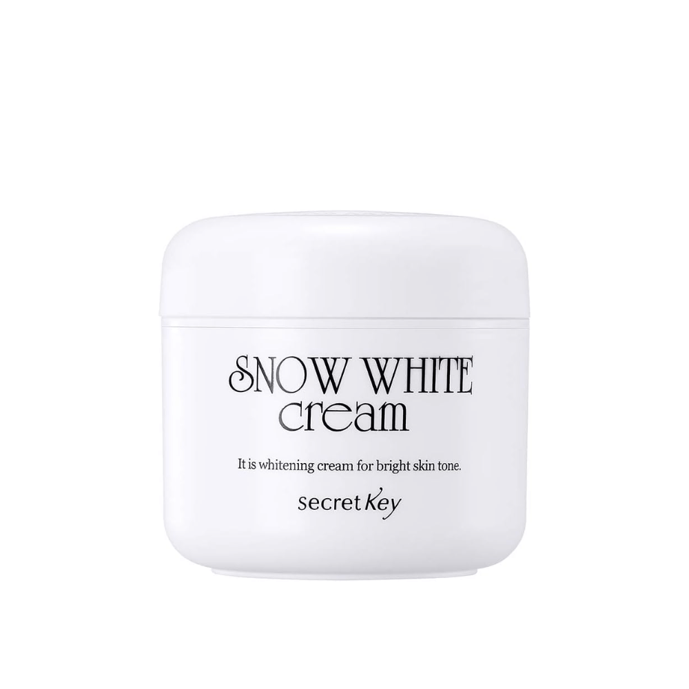 Produktbild av Secret Key Snow White Cream i vit burk med svart text mot vit bakgrund.