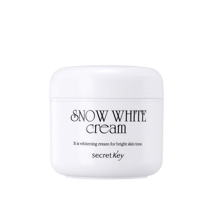 Produktbild av Secret Key Snow White Cream i vit burk med svart text mot vit bakgrund.