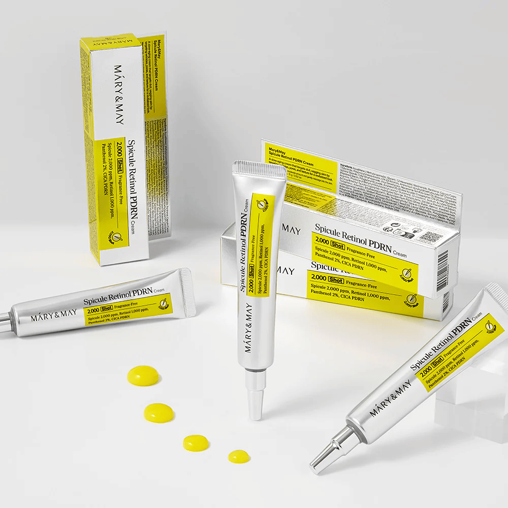 MARY & MAY Spicule Retinol PDRN Cream z kilkoma tubkami i widoczną konsystencją kremu, opracowany w celu stymulacji odnowy komórek, poprawy elastyczności i uzyskania bardziej jednolitego kolorytu skóry.
