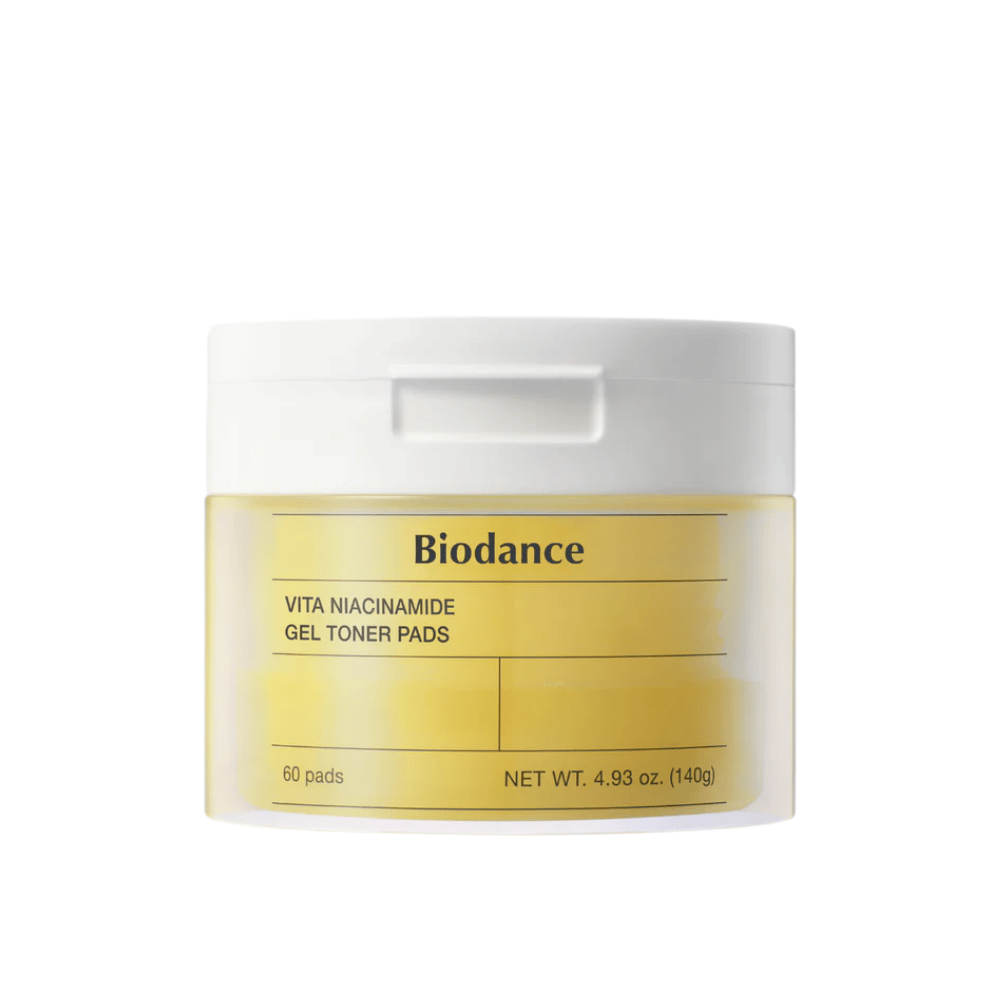 Biodance Vita Niacinamide Gel Toner Pads – opakowanie z 60 płatkami w żółtym słoiku z białą pokrywką, zaprojektowane do wyrównywania kolorytu skóry i nadawania blasku.