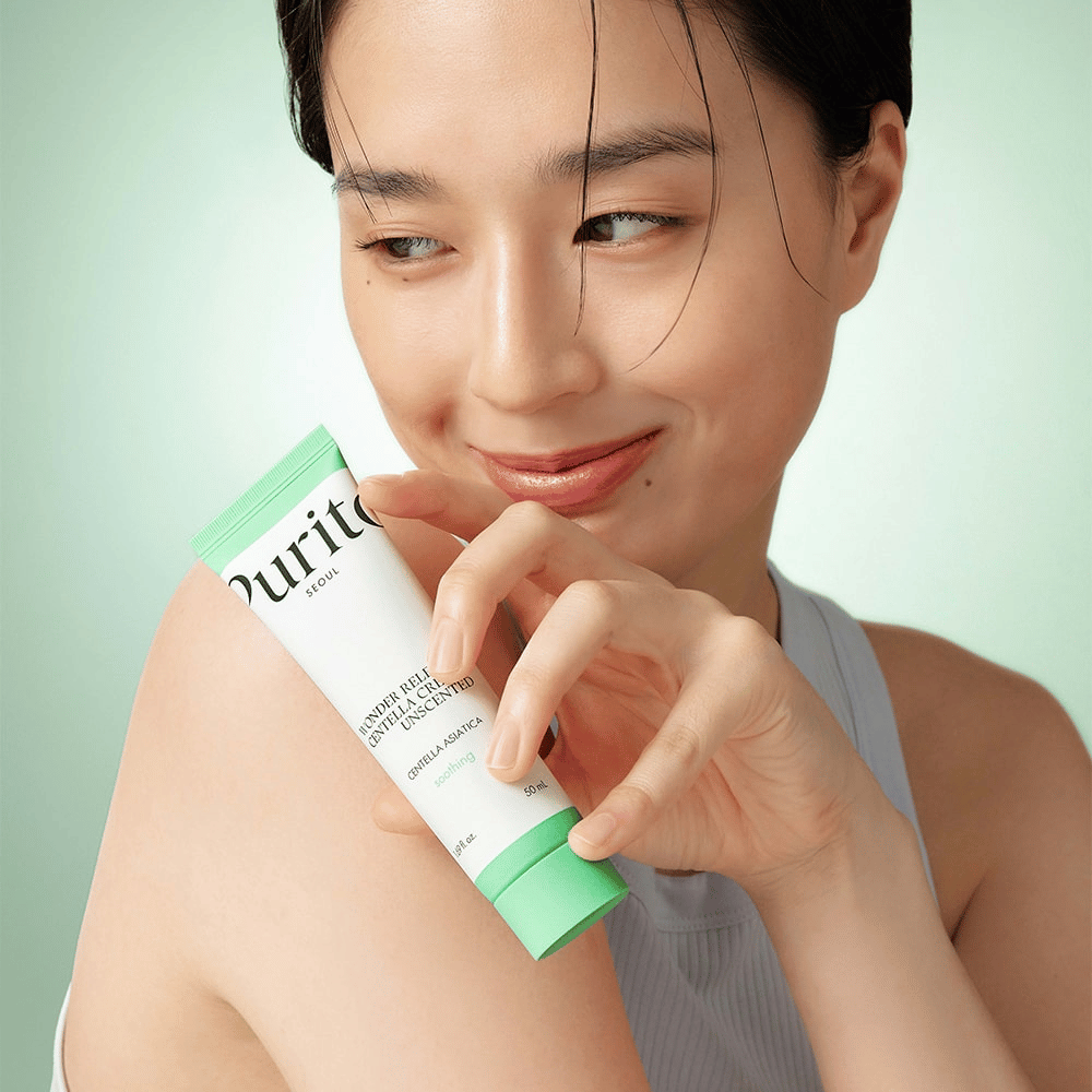 Purito Wonder Releaf Centella Cream Unscented to kojący i nawilżający krem wzbogacony o Centella Asiatica. Ta bezzapachowa formuła pomaga łagodzić podrażnioną skórę, nawilżać i wzmacniać barierę skórną, nie powodując podrażnień. Idealny dla skóry wrażliwej.