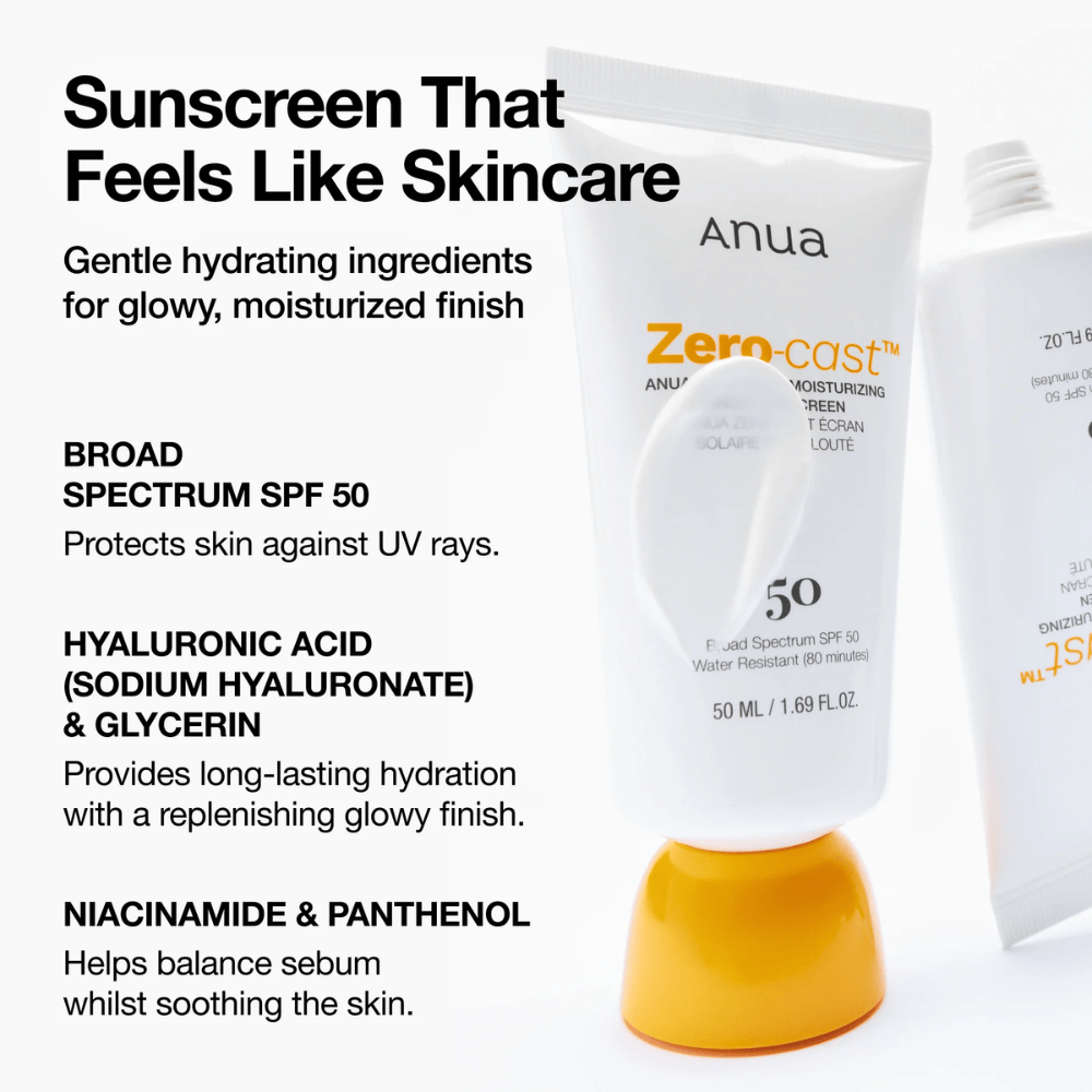 Zbliżenie na ANUA Zero-Cast Moisturizing Sunscreen z SPF 50 – krem przeciwsłoneczny w białej tubie z pomarańczową nakrętką, pokazujący tekst o składnikach, takich jak kwas hialuronowy, niacynamid i pantenol dla nawilżonej, chronionej skóry.
