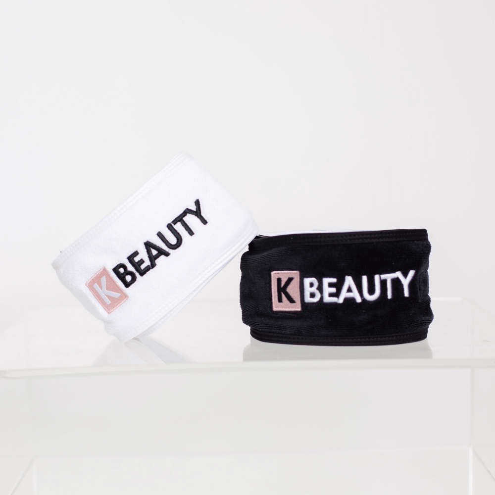 Dwie K-Beauty Opaski do Makijażu z napisem "piękno".