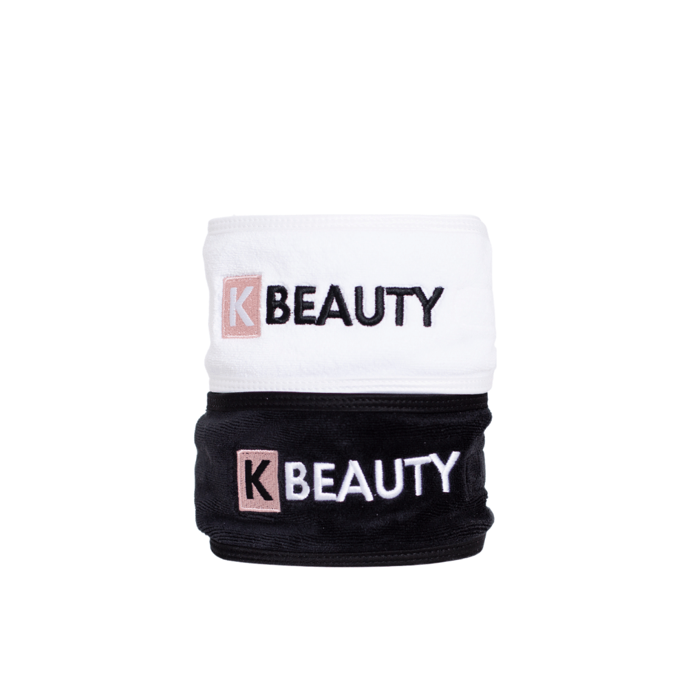 Dwa czarno-białe K-Beauty Opaski do Makijażu z napisem piękno.